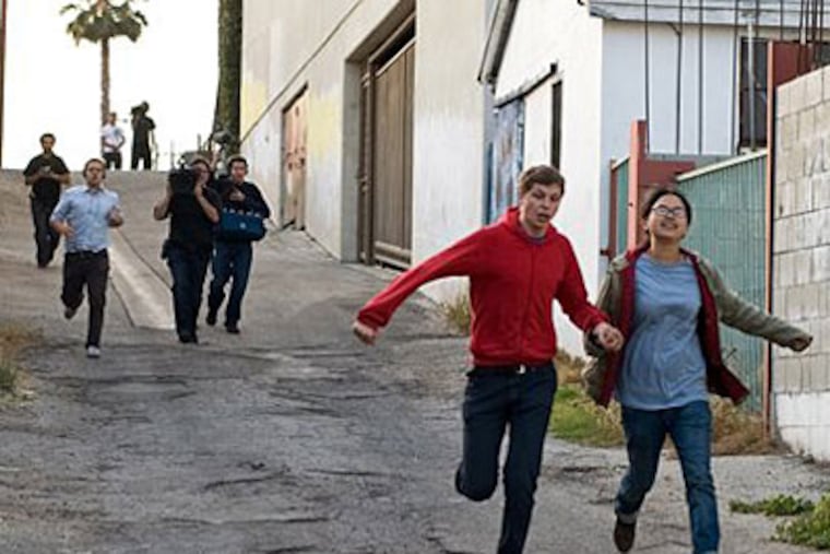 Charlyne Yi sets out to make a documentary about love and then falls for her former co-star, Michael Cera, in "Paper Heart." (AP Photo/Overture Films, Justina Mintz)