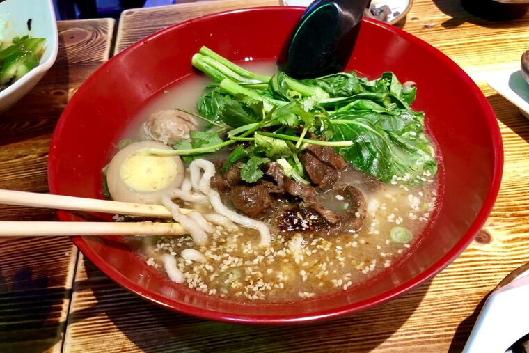 Hakka beef noodle soup, with tender braised beef, thick and chewy noodles and a deep broth enriched with roasted onion sesame paste is the highlight at Hakka Beef House in Chinatown.