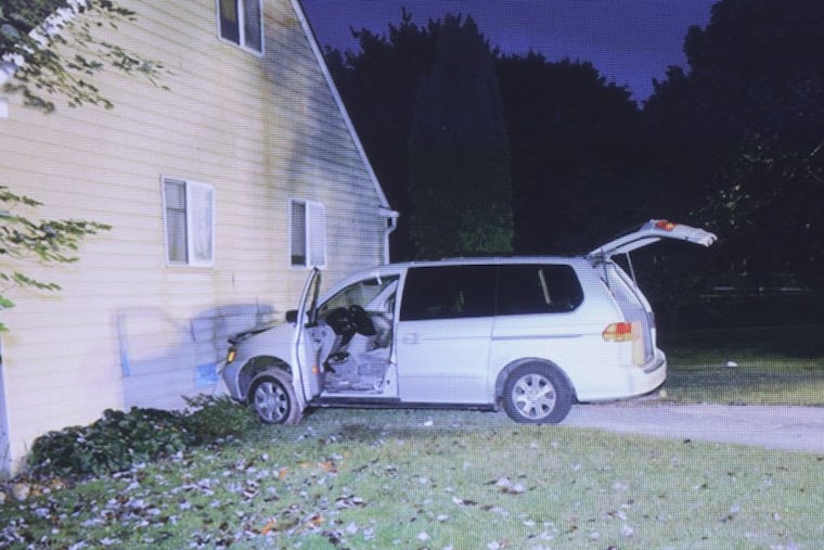 Bruce Rogal's crashed van at his ex-wife's West Bradford home, where he shot himself after a police chase.