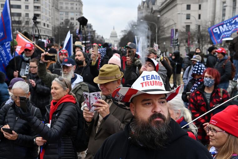 Supporters of President Donald Trump gather at Freedom Plaza on Tuesday.