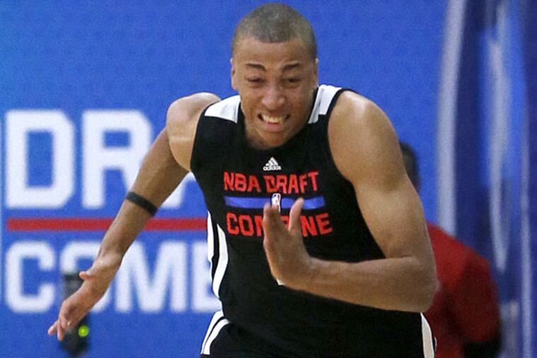 Dante Exum, from Australia, participates in the three-quarters-court sprint in the 2014 NBA basketball draft combine Friday, May 16, 2014, in Chicago. (Charles Rex Arbogast/AP)