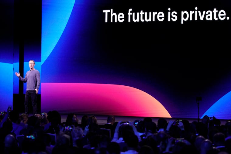 Facebook CEO Mark Zuckerberg, left, makes the keynote speech at F8, the Facebook's developer conference, in San Jose, Calif., April 30. Facebook, currently under government investigation for mishandling personal information, is also under fire for refusing to remove a doctored video of House Speaker Nancy Pelosi.