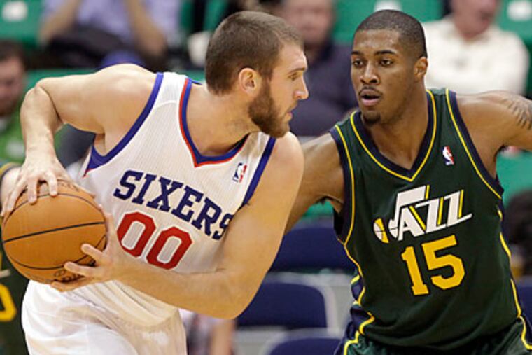 Starting with tonight's game, the Sixers will play eight games in 11 days. (Jim Urquhart/AP)