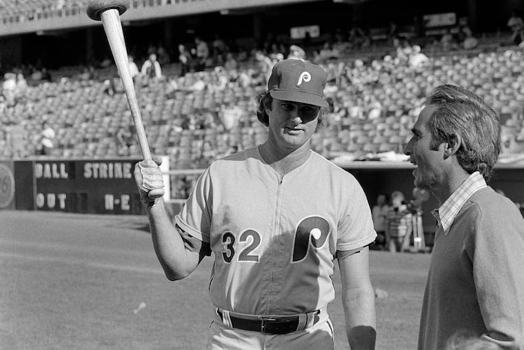 Former Los Angeles Dodgers pitching great Sandy Koufax, right, has a few words with Philadelphia Phillies pitcher Steve Carlton before the start of the National League playoffs in Los Angeles, Oct. 4, 1977. Carlton is the Phillies' starting pitcher. (AP Photo)