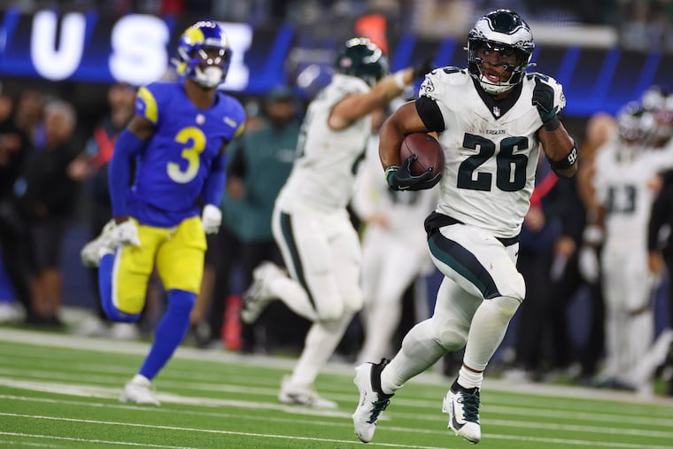 Philadelphia Eagles running back Saquon Barkley scores.a a touchdown during the fourth quarter of the Los Angeles Rams game against the Philadelphia Eagles on Sunday, Nov. 24, 2024, at SoFi Stadium in Inglewood, Calif.