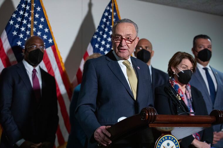 Senate Majority Leader Chuck Schumer, D-N.Y., speaking to reporters on Tuesday.