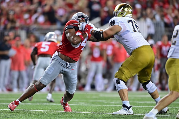 Notre Dame's Joe Alt blocking Ohio State defensive end Tyler Friday on Sept. 3, 2022.