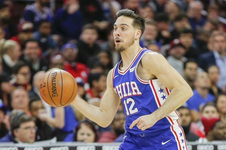 Sixers guard T.J. McConnell dribbles the basketball against the Cleveland Cavaliers on Monday, November 27, 2017 in Philadelphia.