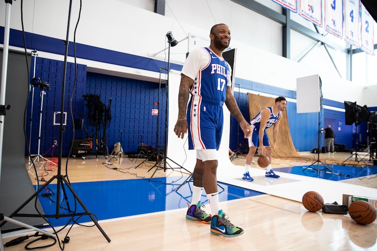 New Sixer P.J. Tucker takes part in media day on Monday.