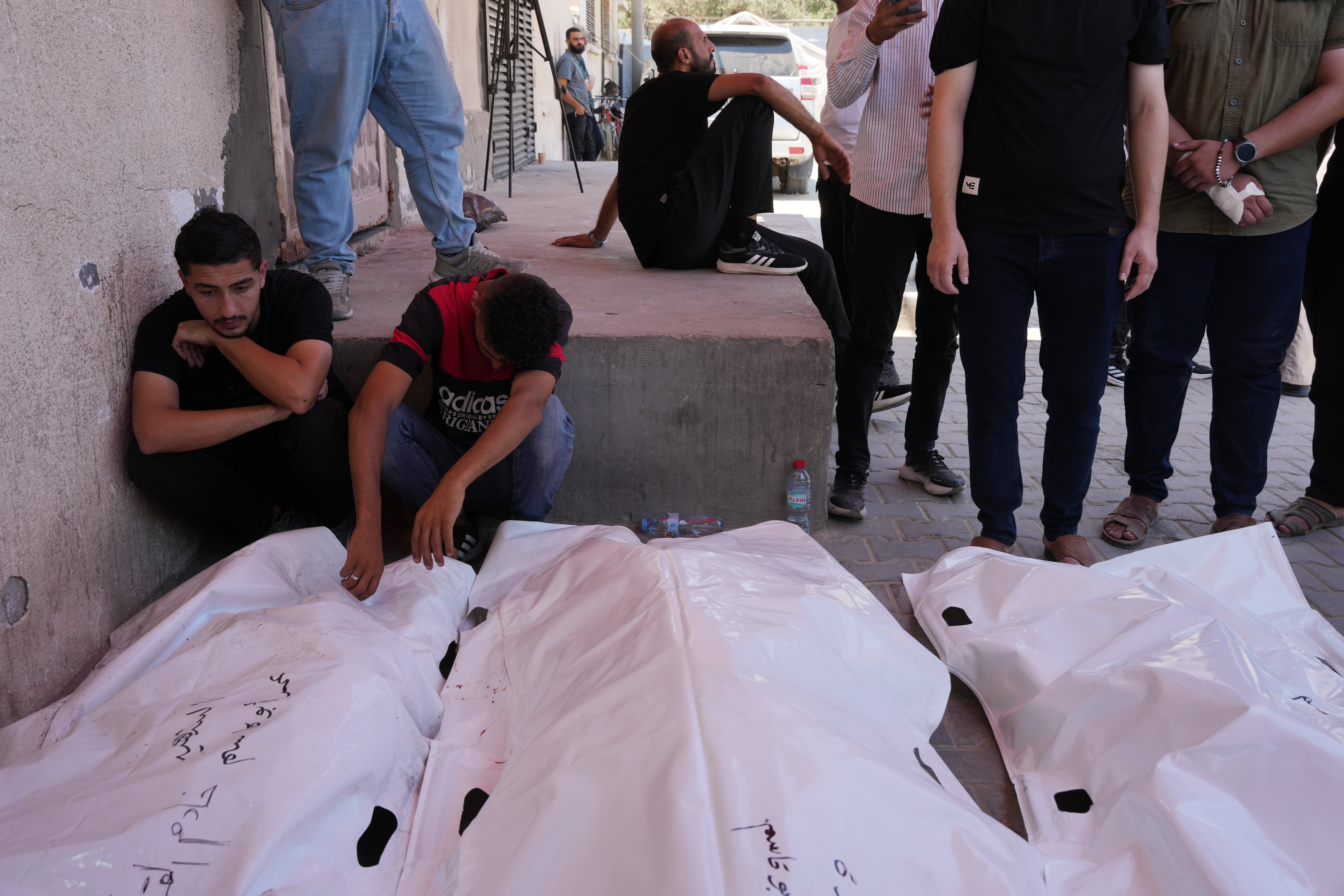 Israel's latest strikes kill a dozen people in Gaza, including police officers