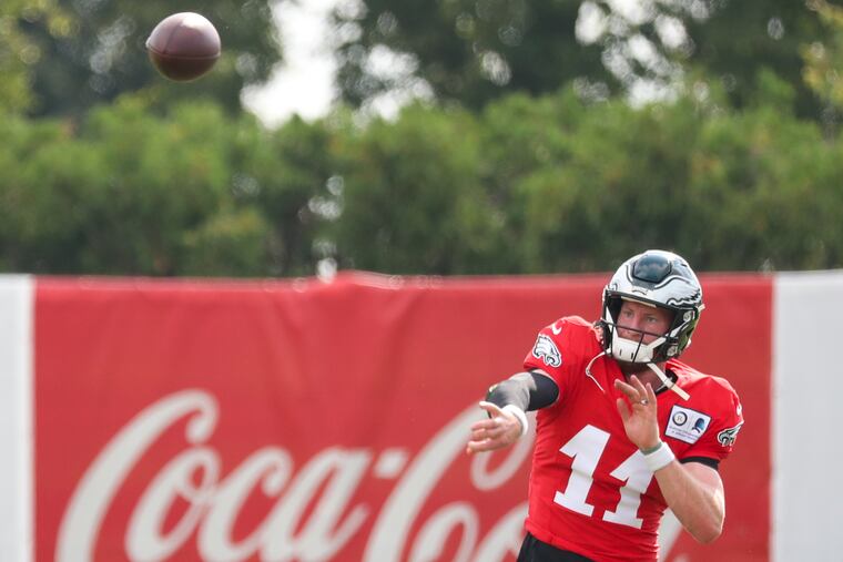 Eagles quarterback Carson Wentz throws the football during a drill at training camp at the NovaCare Complex in South Philadelphia on Saturday, Aug. 03, 2019