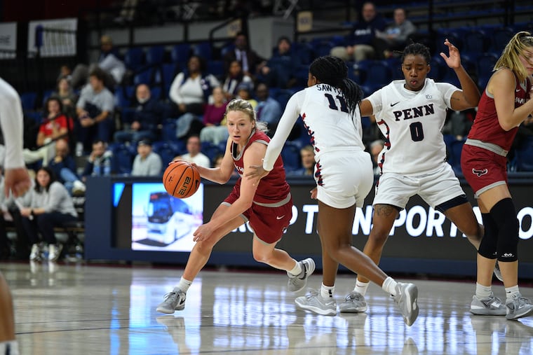 St. Joseph's graduate guard Chloe Welch in action during a game against Penn on Nov. 14. Welch recently scored her 1,000th career point and is filling a leadership role for the Hawks this season after five seasons at Davidson.