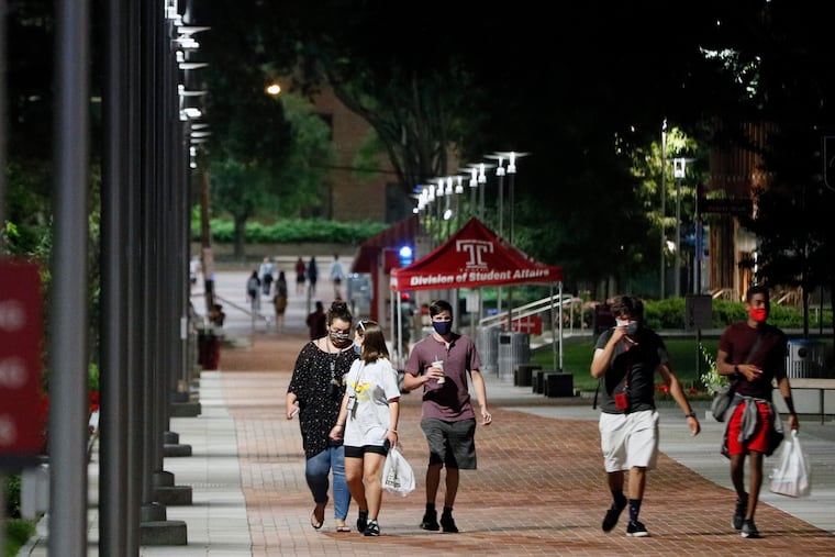 People walk on the Temple campus in Phila., Pa. on Aug. 30, 2020.