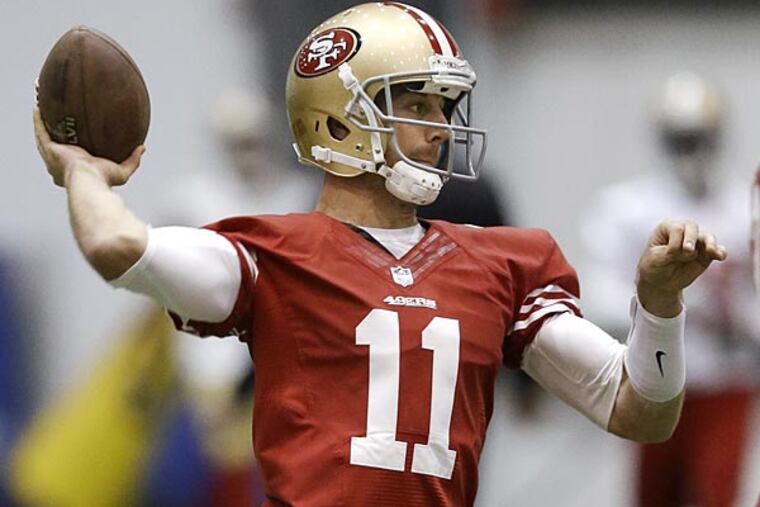 San Francisco 49ers quarterback Alex Smith passes during practice on
Wednesday, Jan. 30, 2013, in New Orleans. The 49ers are scheduled to
play the Baltimore Ravens in the NFL Super Bowl XLVII football game on
Feb. 3. (AP Photo/Mark Humphrey)