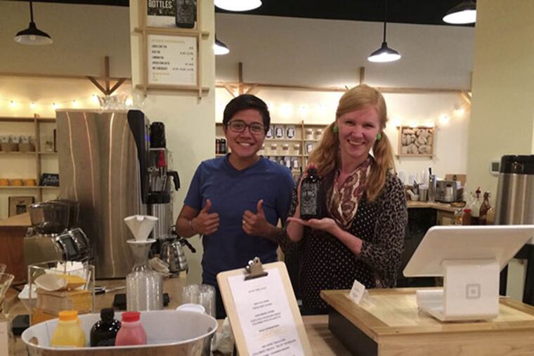 Baristas Ammi Cabrera and Linda Wolfe at Square One Coffee.