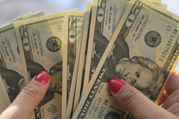 A FILE photo showing twenty dollar bills. Federal government shutdown has ended, but it will take weeks, if not months, for the Small Business Administration to clear the backlog, so business owners may want to look for other options in the short term. (Ekaterina Gaydanskaya/Dreamstime/TNS)