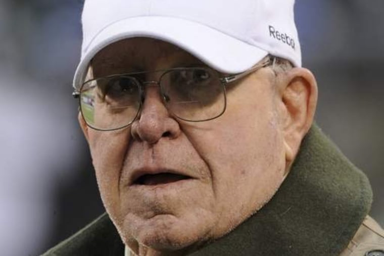 FILE - In this Dec. 12, 2010, file photo, former NFL coach Buddy Ryan appears before an NFL football game between the Miami Dolphins and the New York Jets in East Rutherford, N.J. Cowboys defensive coordinator Rob Ryan said Monday, Sept. 5, 2011, that his dad Buddy Ryan was diagnosed last week with cancer in his gland that spread to his neck. (AP Photo/Bill Kostroun, File)