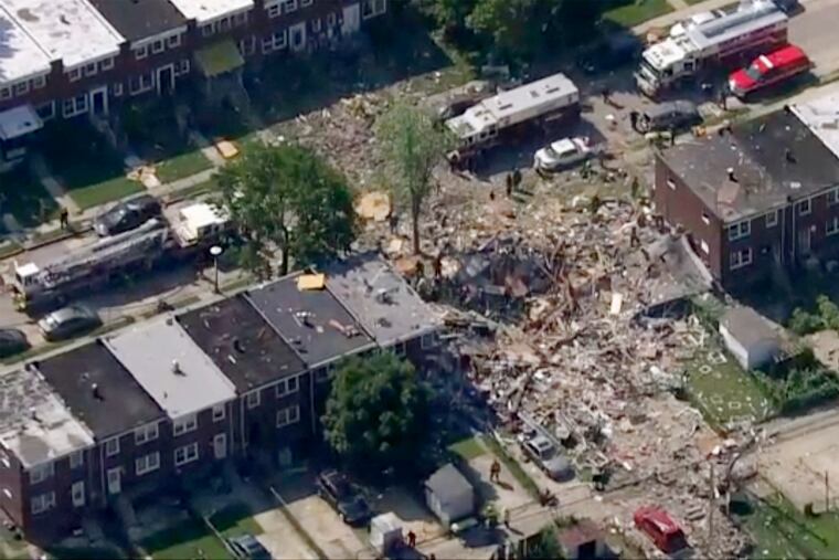This photo provided by WJLA-TV shows the scene of an explosion in Baltimore.