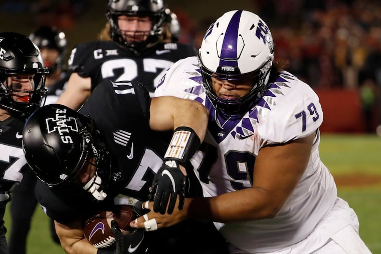 Iowa State defensive back Beau Freyler (17) is tackled by Texas Christian center Steve Avila (79).