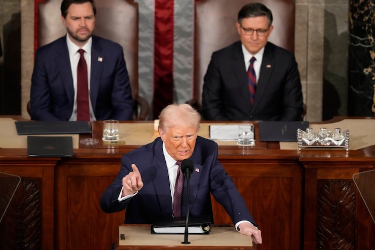 President Donald Trump speaks as Vice President JD Vance, left, and House Speaker Mike Johnson of La., listen as Trump addresses a joint session of Congress at the Capitol in Washington, Tuesday, March 4, 2025.