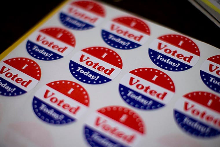 Stickers wait for voters at a polling place in Philadelphia in 2013.