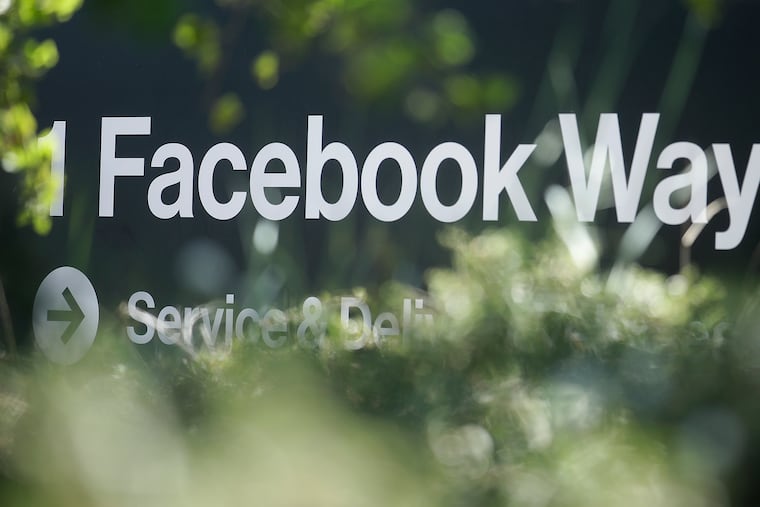 An address sign for Facebook Way is shown in Menlo Park, Calif. in April 2019. Facebook is changing the way it ranks videos and this affects how small businesses use the service. (AP Photo/Jeff Chiu, File)