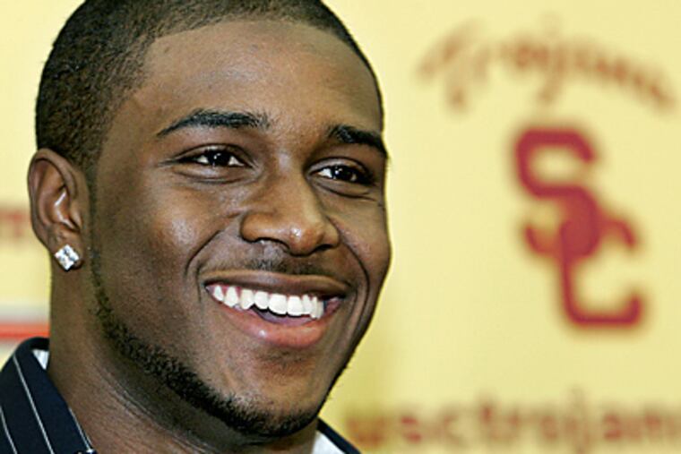 Former USC star Reggie Bush won the Heisman Trophy in 2004 after having 2,218 yards from scrimmage. (AP Photo/Reed Saxon, File)