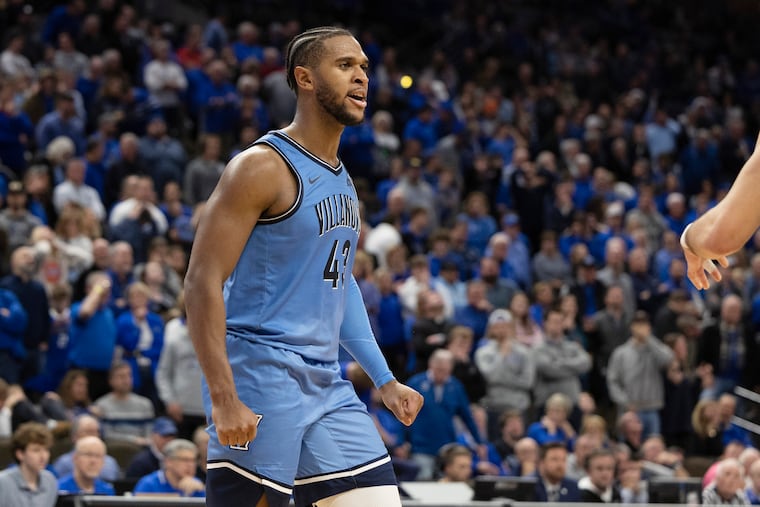 Villanova's Eric Dixon celebrates after Creighton failed to score on its final possession in overtime of their game Wednesday in Omaha, Neb.