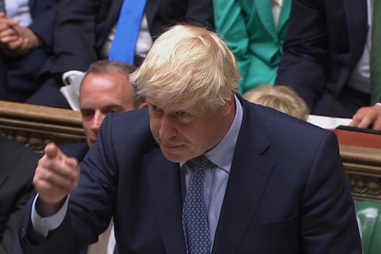 In this handout photo provided by the House of Commons, Britain's Prime Minister Boris Johnson speaks in Parliament in London, Wednesday, Sept. 25, 2019. British lawmakers returned to the House of Commons on Wednesday, venting their pent-up anger over Prime Minister Boris Johnson's failed attempt to suspend Parliament and warning that democracy itself is under threat from the government.