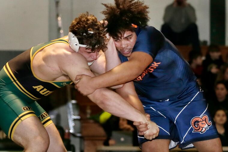 Overbrook heavyweight Deshon Alexander (right) wrestling Audubon's Jeff Jordan earlier this month.