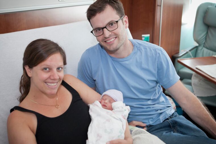 Colleen and Hunter Elwood with little Brady Nash Elwood.