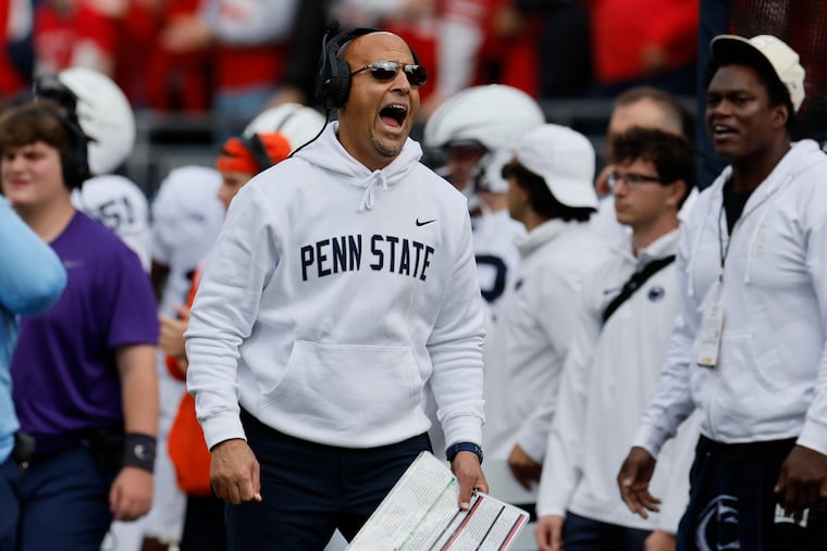 Penn State coach James Franklin shouts to his team during the Nittany Lions' loss to Ohio State on Saturday. On Tuesday, Franklin looked inward and took accountability for a defeat that dropped the team to No. 10 in the AP poll.
