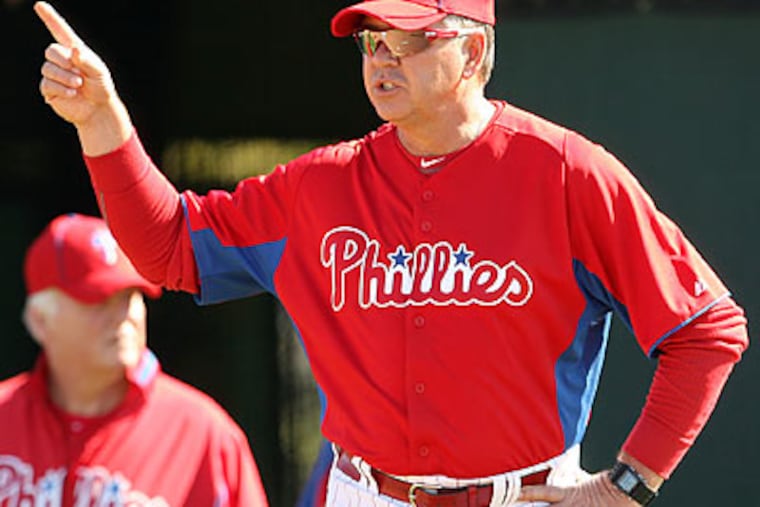 "I rely on Rich a lot," Phillies manager Charlie Manuel said of pitching coach Rich Dubee. (Yong Kim/Staff Photographer)
