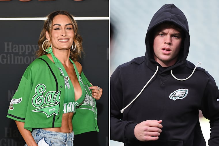 Dating rumors have been swirling around WWE star Nikki Bella, left, and Eagles cornerback Cooper DeJean ever since Bella showed up at an Eagles game wearing a hat with his name.