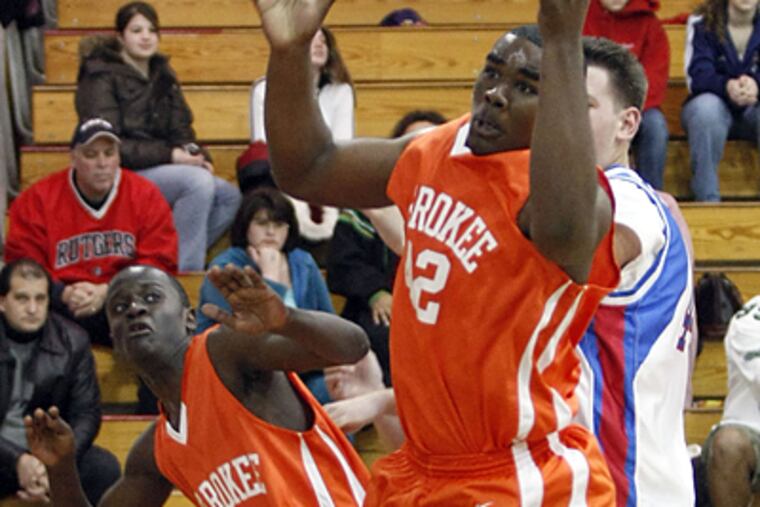 "I just look to stay within my limits and play hard,” Ronson Quick (center) says. (Yong Kim/Staff Photographer)