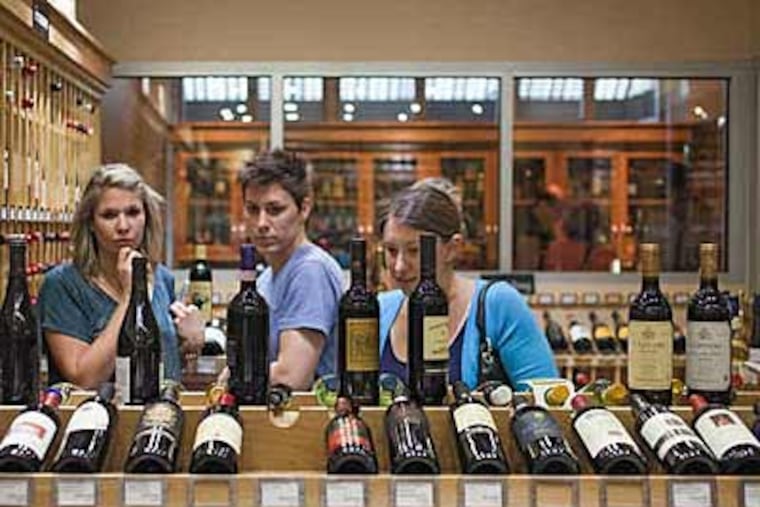 The state's only boutique wine shop is in the Garces Trading Company on Locust Street. A lawsuit, filed by competitors, says the singular arrangement is favoritism by the LCB. (DAVID M WARREN / Staff Photographer)