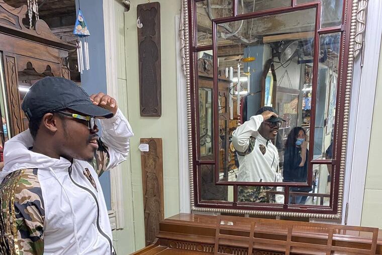 John Capron at Remarkable Cleanouts after he learned he was being given a 1964 Steinway upright piano. Renee Thomas