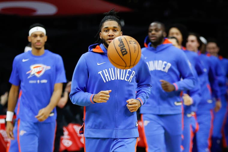 Oklahoma City Thunder guard Isaiah Joe leads his teammates on the court for team warm ups before the Thunder play the Sixers on Thursday, January 12, 2023 in Philadelphia.