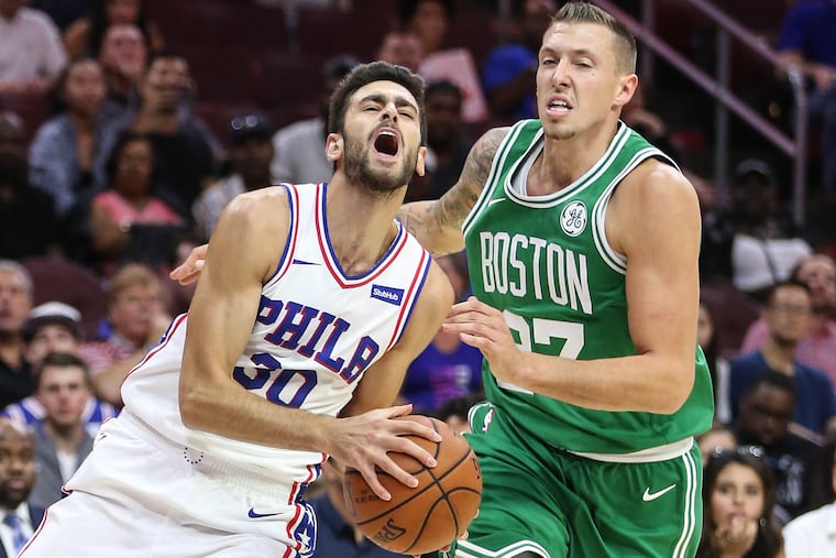 Sixers' sharpshooter Furkan Korkmaz draws a foul against the Celtics in the first night of the Las Vegas summer league on Friday.