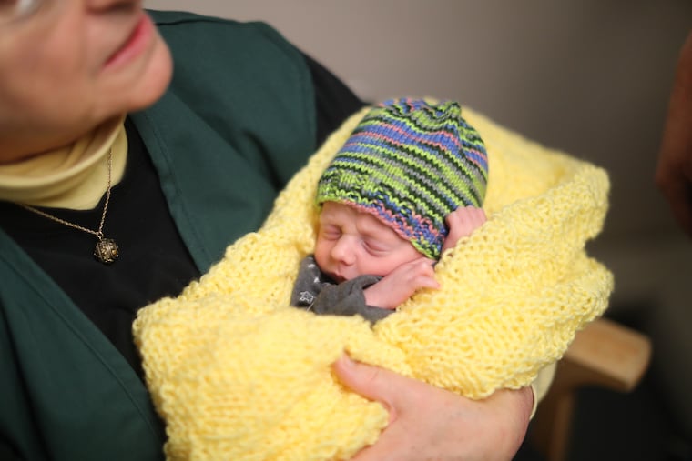 Addy Schultz, 72, a "cuddler" at Thomas Jefferson University Hospital, helps babies born with neo-natal abstinence syndrom through withdrawal symptoms.