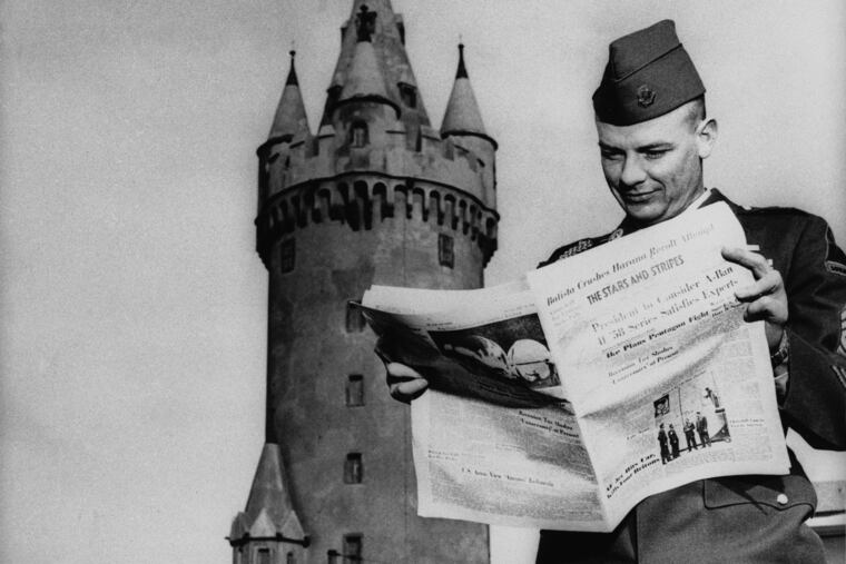 A GI reads a recent edition of Stars and Stripes in Frankfurt, West Germany, on April 24, 1967.
