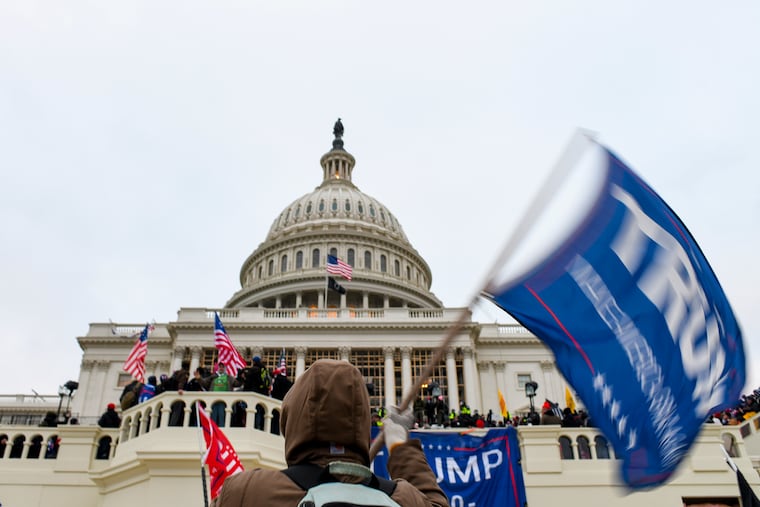 Supporters of President Donald Trump approach the Capitol in Washington, Jan. 6, 2021. The Justice Department made an unusual effort on Thursday, May 20, 2026, to short-circuit a series of civil lawsuits seeking to hold President Trump accountable for his supporters’ attack on the Capitol on Jan. 6, 2021.