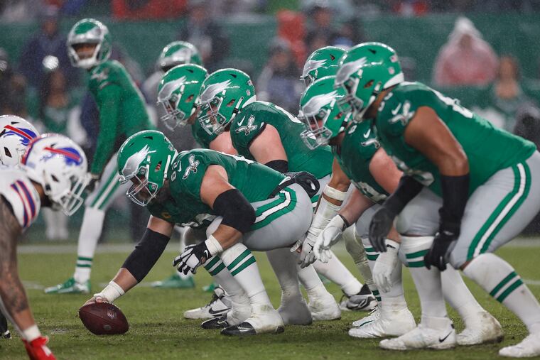 Eagles center Jason Kelce with his fellow offensive linemen during the game against the Buffalo Bills on Nov. 26.