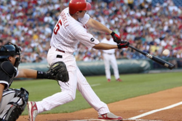 Pat Burrell insists he is not trying to compare himself to stars Chase Utley and Ryan Howard.