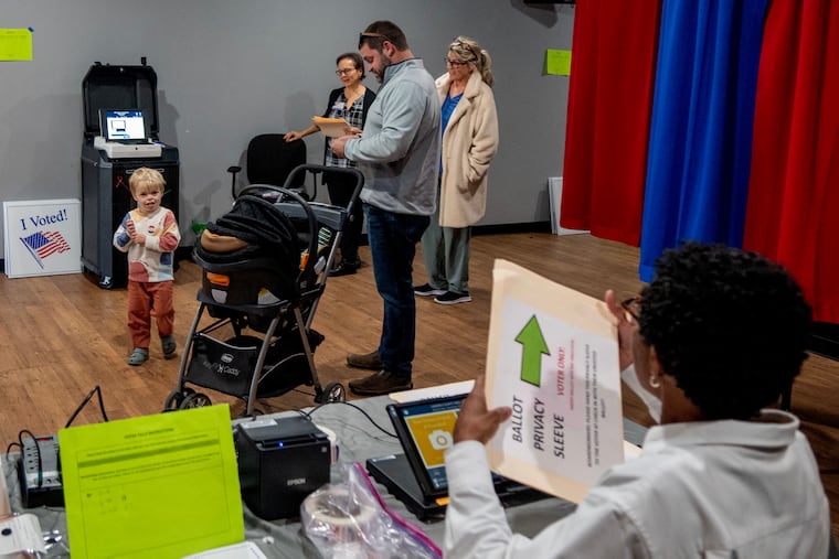 Voters convene at the Erlton Fire House on Route 70 in Cherry Hill in November. A Penn researcher linked the act of voting to living longer in older adults.