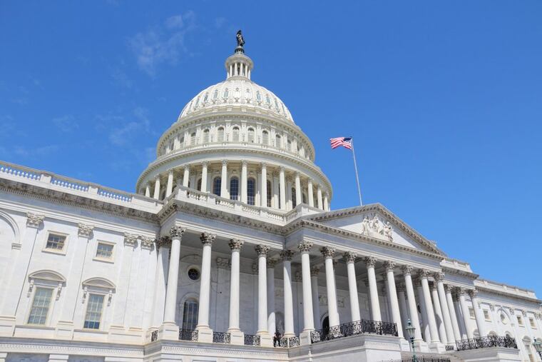 Washington DC, United States landmark. National Capitol building with US flag.