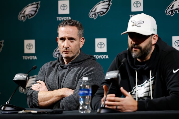 Howie Roseman (left), Nick Sirianni and the Eagles' deciders have cast a wide net at offensive coordinator.