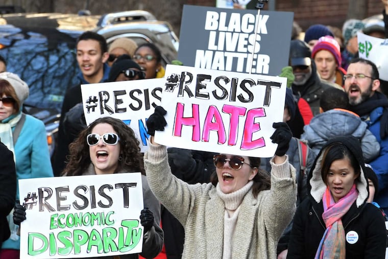 On Sixth Street, marchers yell out their messages. They came from a wide range of backgrounds — from Teamsters to Black Lives Matter activists.