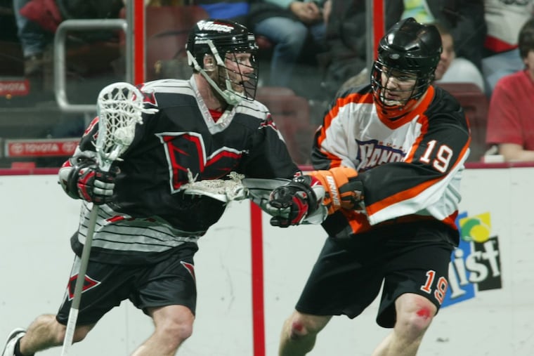Jeff Spano (left) of the Philadelphia Wings indoor lacrosse team in 2005. Photo by Len Redkoles