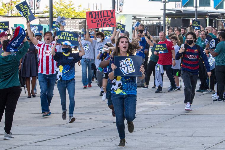 Philadelphia soccer fans greet FIFA officials in September 2021 during a pep rally at Lincoln Financial Field.